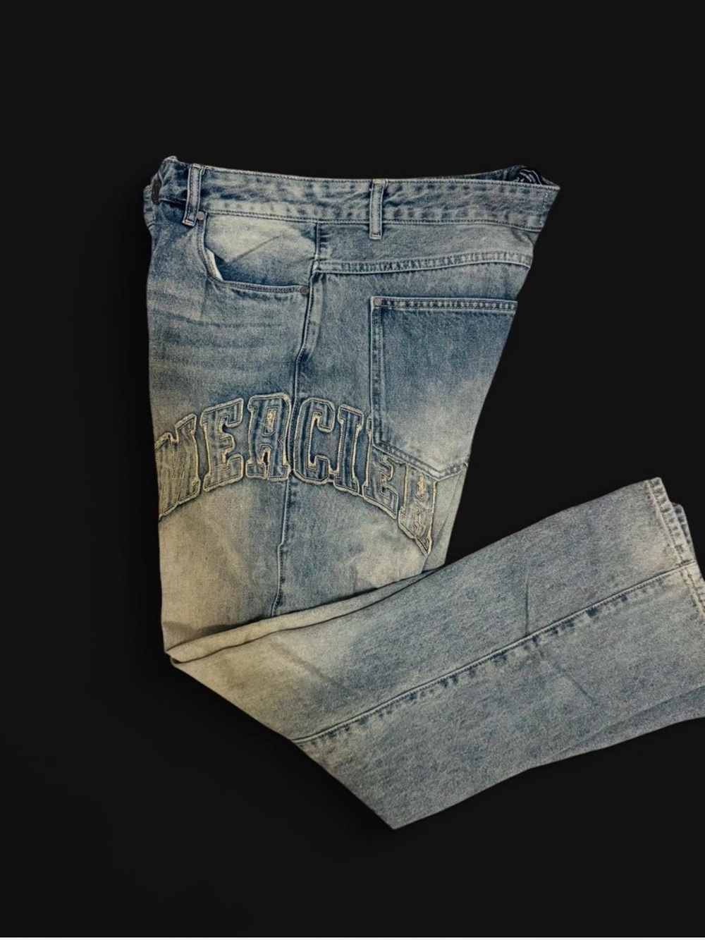 Baggy Men’s distressed Jeans in Faded Light Blue with Embroidered Back